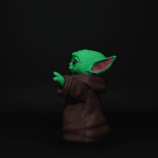 Figurină 3D Baby Yoda de pictat, inspirată din Star Wars: The Mandalorian. Detalii expresive, material eco-friendly, ideală pentru copii, colecționari și fanii universului Star Wars.