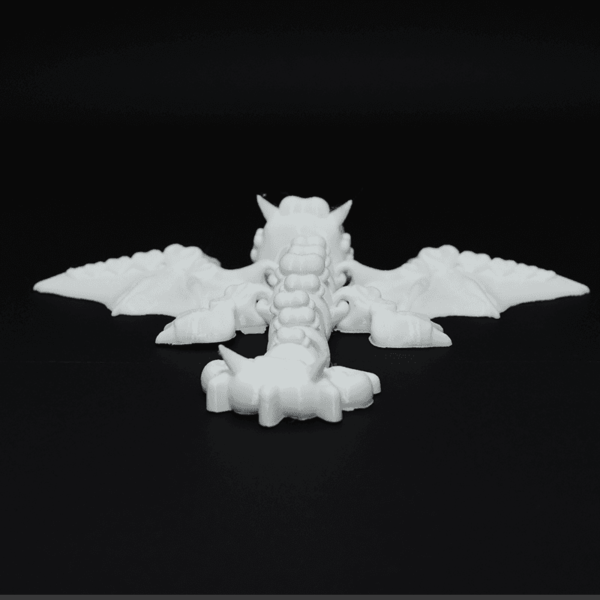 Figurină 3D Dragonita Fluffy de pictat, cu articulații mobile la cap, picioare, coadă și aripi. Fabricată din material eco-friendly, ideală pentru joacă, decor și colecționari pasionați de fantezie.