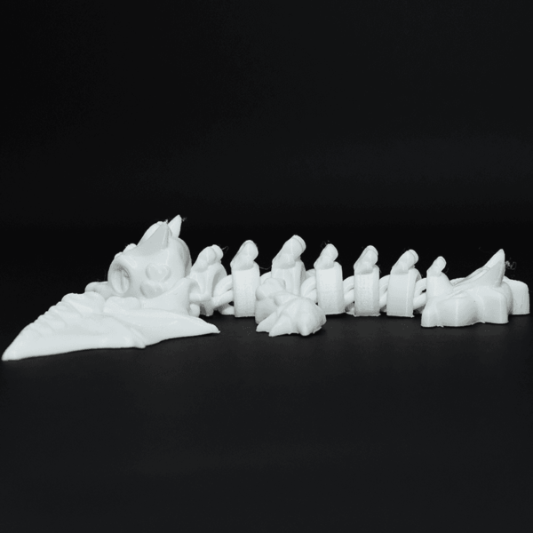 Figurină 3D Dragonita Fluffy de pictat, cu articulații mobile la cap, picioare, coadă și aripi. Fabricată din material eco-friendly, ideală pentru joacă, decor și colecționari pasionați de fantezie.